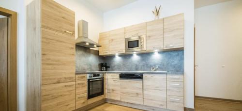 Ski apartment Alpendorf – Photos 5