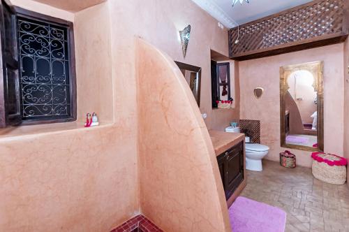 a bathroom with a sink and a toilet at Riad Dar Nadwa in Marrakesh