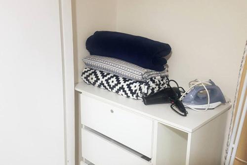 a shelf with two pillows on top at Studio 1811 Campinas SP in Campinas