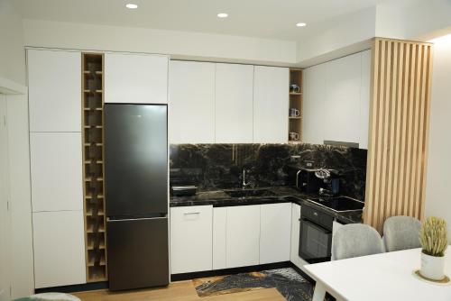 Η κουζίνα ή μικρή κουζίνα στο Feel Home Apartment