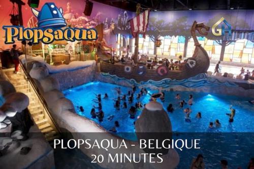 - un parc aquatique avec un toboggan dans l'établissement La Villa Marine*Familiale et Conviviale, à Coudekerque-Branche