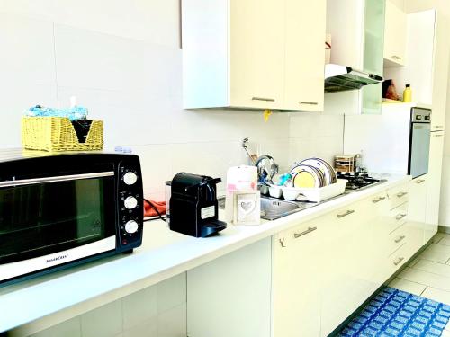 Una cocina o zona de cocina en DGS APARTHOTEL
