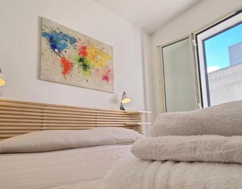 Cama o camas de una habitación en DGS APARTHOTEL