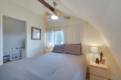 a bedroom with a large bed and a window at Mariposa Home Furnished Patio and Sierra Mtn Views in Mariposa