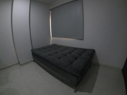 Katil atau katil-katil dalam bilik di Balcones de la Rivera Apartamento Azulejo 3