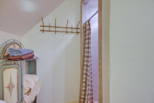 a bathroom with a mirror and a shower in a room at Large Family Home with View, 1 Mi to Red Lodge Ski! in Red Lodge