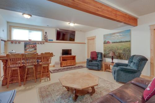 a living room with a couch and a table at Large Family Home with View, 1 Mi to Red Lodge Ski! in Red Lodge