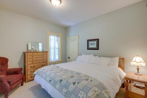 a bedroom with a bed and a chair and a dresser at Large Family Home with View, 1 Mi to Red Lodge Ski! in Red Lodge