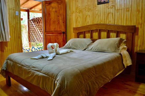 Postel nebo postele na pokoji v ubytování Hostal Michel
