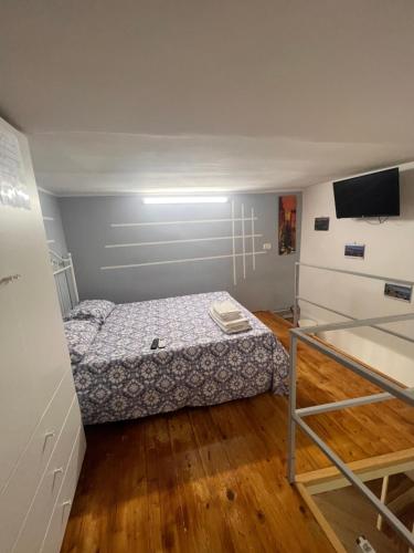 Кровать или кровати в номере Casa Basile 15