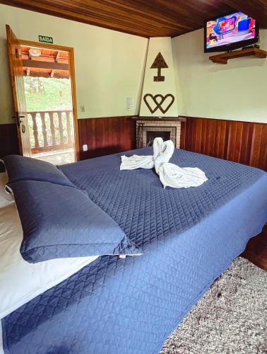 Katil atau katil-katil dalam bilik di Hotel Pião Mineiro
