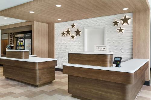 a restaurant with stars on the wall at Hilton Garden Inn Houston Energy Corridor in Houston
