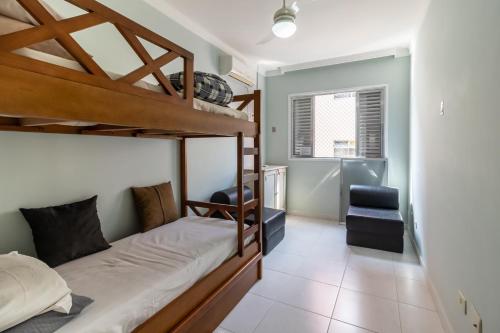 Postel nebo postele na pokoji v ubytování Apartamento Guarujá Praia Tombo