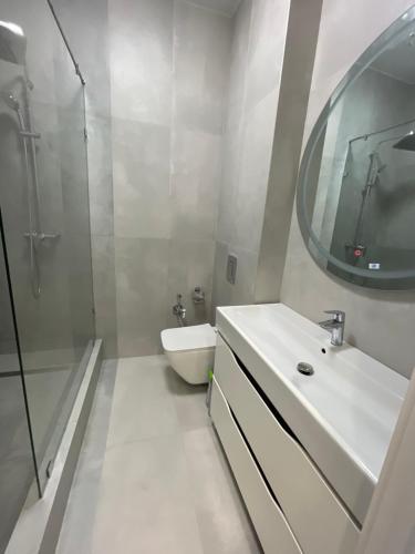 Ванная комната в Стильные апартаменты недалеко от Парка Президента