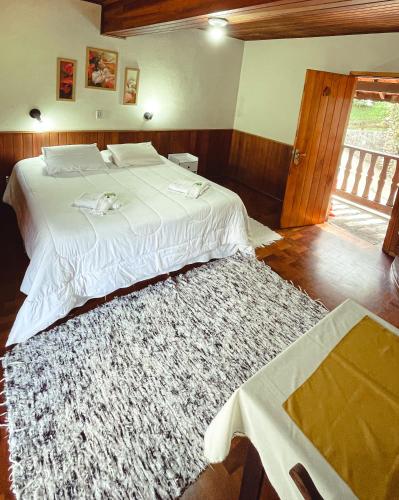 Katil atau katil-katil dalam bilik di Hotel Pião Mineiro