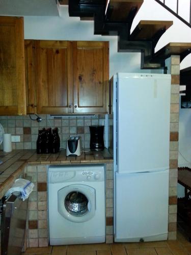 Dapur atau dapur kecil di Refurbished 3 Bedroom Farmhouse in Emilia