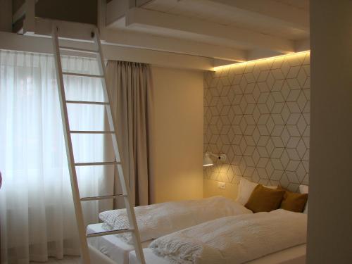 Postel nebo postele na pokoji v ubytování Hotel Restaurant Flaschen