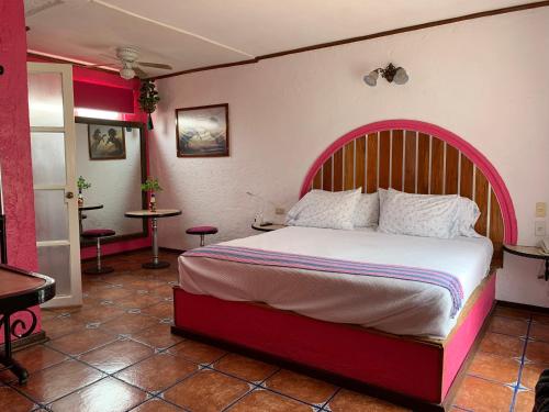 Cama o camas de una habitación en Mesón Yollotl