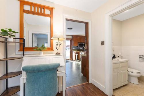 a bathroom with a desk and a toilet in a room at 5 Bedroom Cozy New England home - Cobb Meadow House in Dublin
