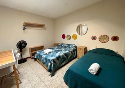 Ένα ή περισσότερα κρεβάτια σε δωμάτιο στο CASA CEMPOAL