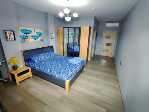En eller flere senge i et værelse på Апартаменты у моря - в "Green City RESORT"