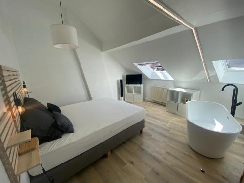 Ένα ή περισσότερα κρεβάτια σε δωμάτιο στο Namur BnB