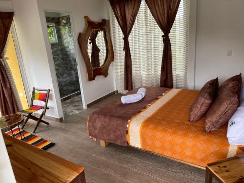 Hotel Pachamama Campestreにあるベッド