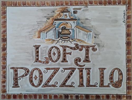 a sign for the lodge of rotunda at Loft Pozzillo in Monreale