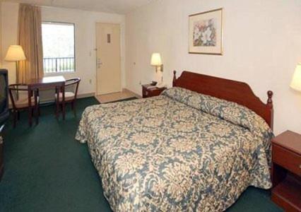 Katil atau katil-katil dalam bilik di Country Hearth Inn & Suites Dawson