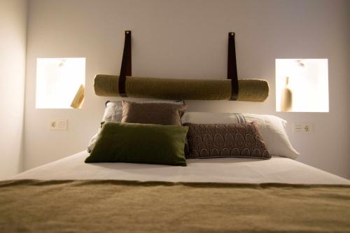 Ένα ή περισσότερα κρεβάτια σε δωμάτιο στο Casa con terraza y patio privado en Salobreña