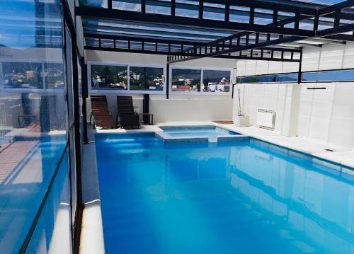 Πισίνα στο ή κοντά στο Departamento Villa Carlos Paz Miralejos 3