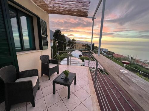 a balcony of a house with a view of the ocean at Terrazze sul golfo apartments in Castellammare del Golfo