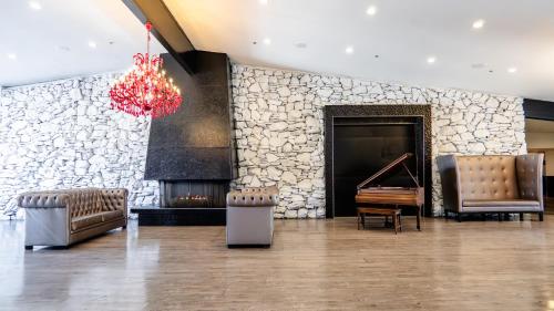 Χώρος καθιστικού στο G T Hotels Inn & Suites Extended Stay