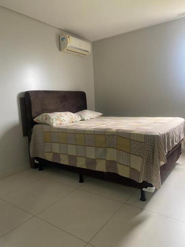 Postel nebo postele na pokoji v ubytování Flat com ótima localização - 505