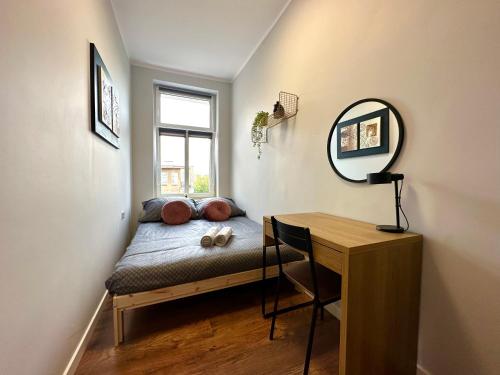 Postel nebo postele na pokoji v ubytování MMRent Swamp Room