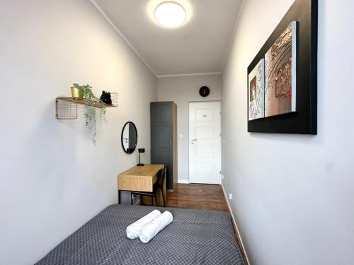 Postel nebo postele na pokoji v ubytování MMRent Swamp Room