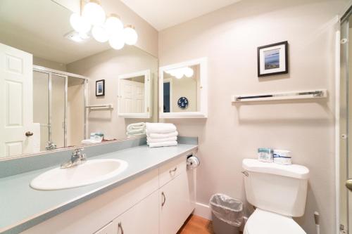 a bathroom with a sink and a toilet at SeaQuell in Depoe Bay