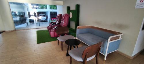 a waiting room with a bunch of suitcases on the wall at TIMURBAY KUANTAN -BEACHFRONT PARADISE GETAWAY in Kuantan