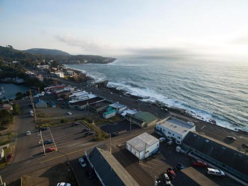 an aerial view of a beach and the ocean at Bay Echo in Depoe Bay