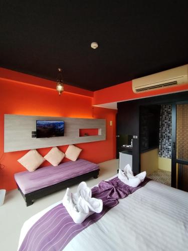 Una cama o camas en una habitación de Bhundhari Chaweng Beach Resort Koh Samui - SHA Plus