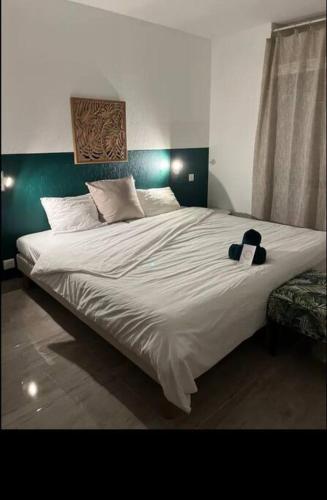 Cama o camas de una habitación en Le Mik-Appartement