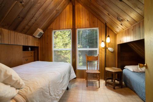 Ένα ή περισσότερα κρεβάτια σε δωμάτιο στο The Cedar House