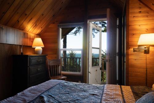 Ένα ή περισσότερα κρεβάτια σε δωμάτιο στο The Cedar House