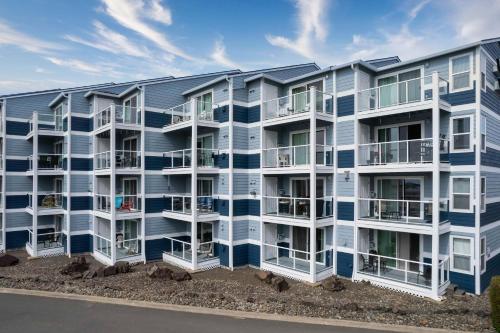 an image of an apartment building with balconies at Waters Edge 304 in Lincoln City