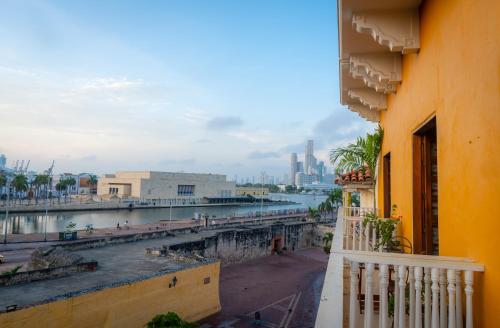 a view of a city from a balcony of a building at Amara Living in Cartagena de Indias