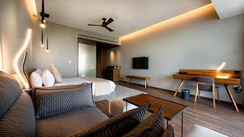 TV a/nebo společenská místnost v ubytování Aria Resort & Spa