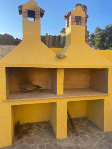 a play house made out of a lego building at S’apposentu in Solinas