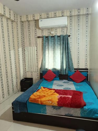 מיטה או מיטות בחדר ב-Hotel Mahati