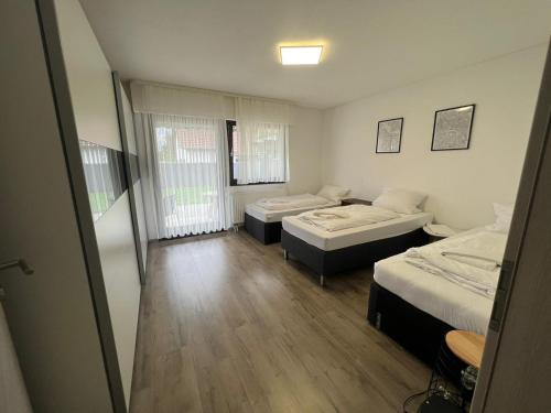 Posteľ alebo postele v izbe v ubytovaní Timeless: Schönes 4 Zimmer Apartment EG
