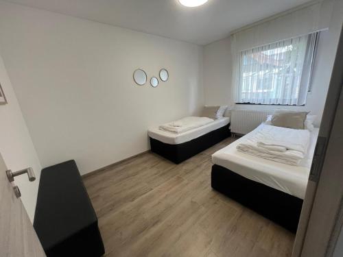 Posteľ alebo postele v izbe v ubytovaní Timeless: Schönes 4 Zimmer Apartment EG